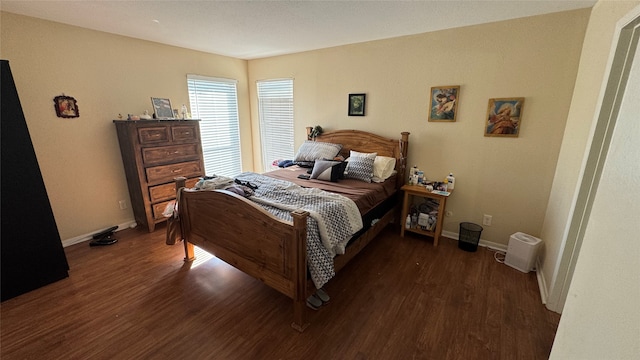 bedroom featuring dark wood-type flooring