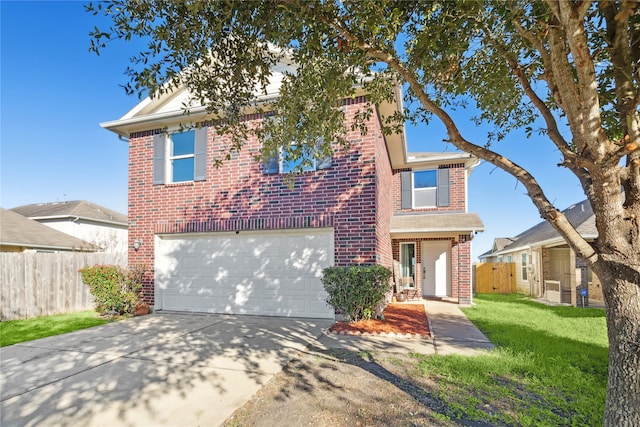 front of property featuring a garage and a front yard