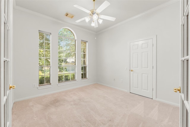 23 Wilmington Way, Conroe, TX 77384 - carpeted empty room with crown molding, ceiling fan, and baseboards
