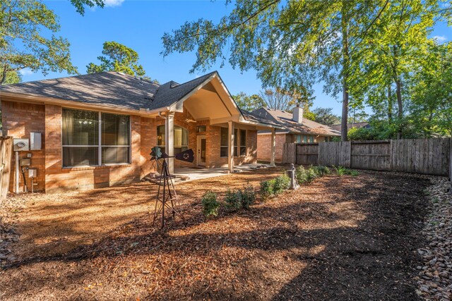 rear view of property with a patio area