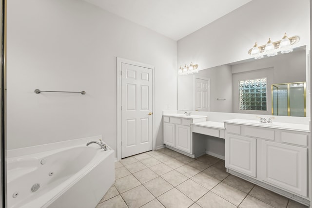 bathroom featuring vanity, independent shower and bath, and tile patterned flooring