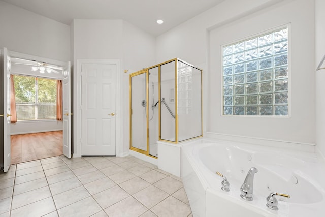 23 Wilmington Way, Conroe, TX 77384 - full bathroom with a stall shower, a tub with jets, tile patterned flooring, and ceiling fan
