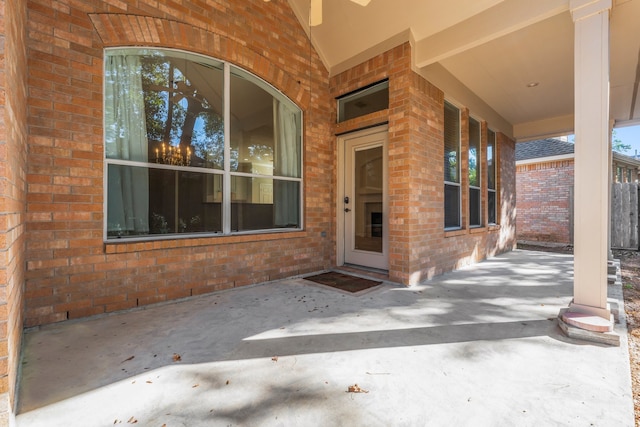 property entrance featuring a patio