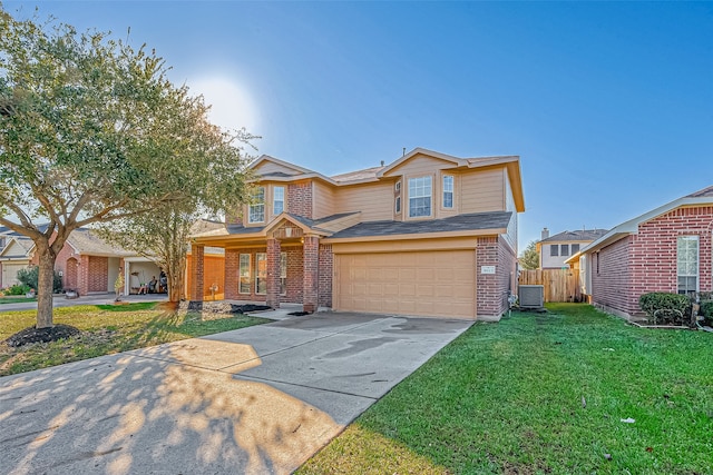 view of front of house featuring cooling unit, a front yard, and a garage