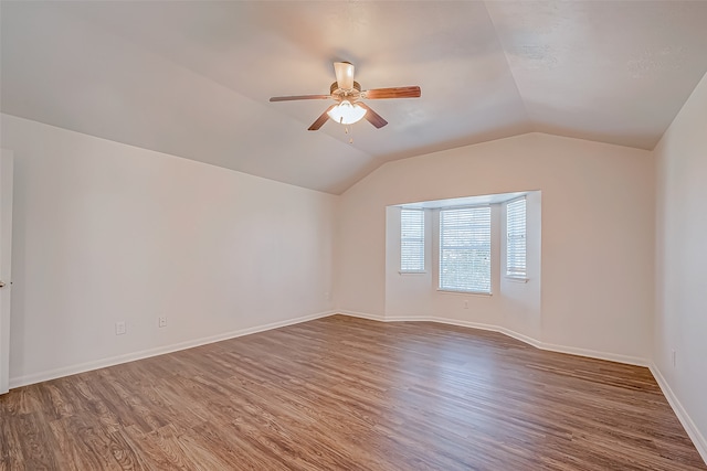 bonus room featuring hardwood / wood-style floors, ceiling fan, and lofted ceiling