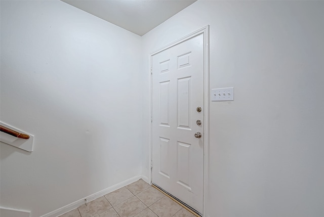 entryway featuring light tile patterned floors