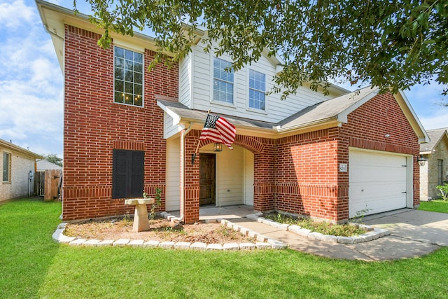 view of front of house featuring a front lawn and a garage