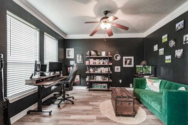 office area with wood-type flooring, a textured ceiling, ceiling fan, and ornamental molding