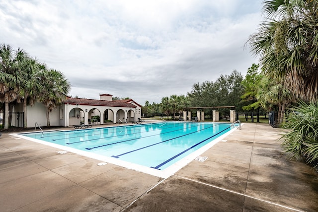 view of pool featuring a patio