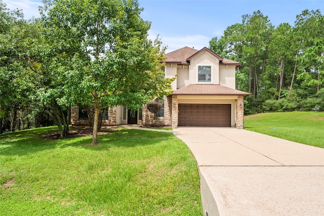 view of front facade featuring a front lawn and a garage