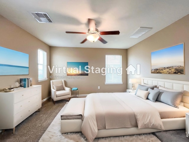 bedroom with dark carpet and ceiling fan