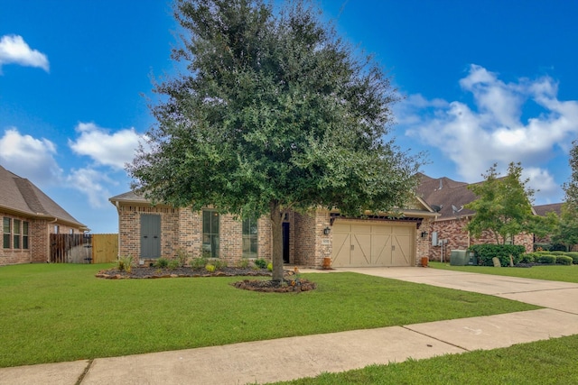 view of front facade featuring a front yard and a garage