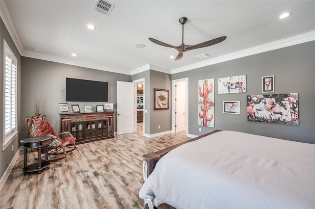 bedroom featuring ceiling fan, light hardwood / wood-style flooring, and ornamental molding