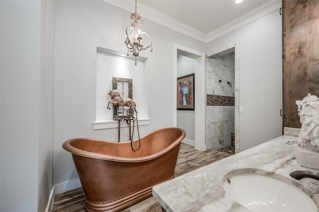 bathroom with separate shower and tub, hardwood / wood-style floors, vanity, and crown molding