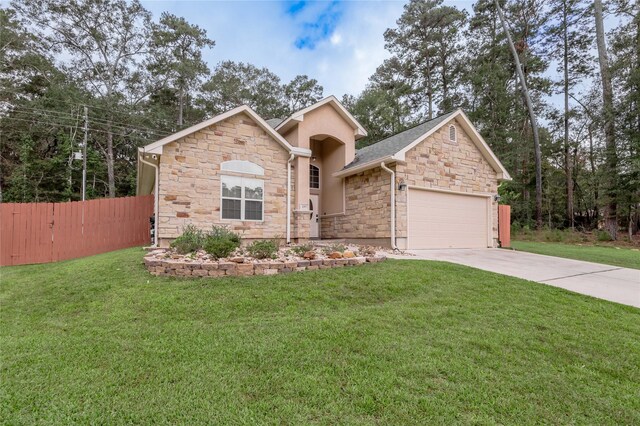 view of front facade with a front lawn and a garage