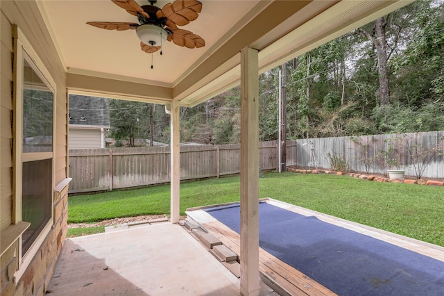 exterior space featuring ceiling fan