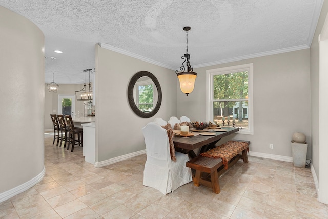 dining space featuring crown molding, a textured ceiling, and light tile patterned flooring