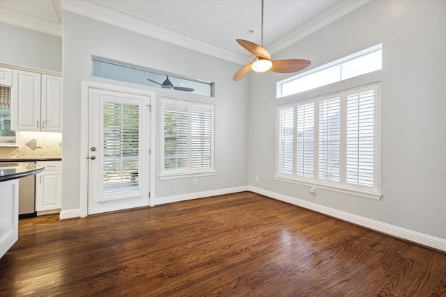 interior space featuring ceiling fan, dark hardwood / wood-style floors, and crown molding