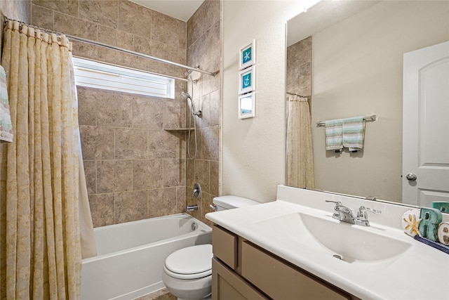 full bathroom featuring toilet, vanity, and shower / bath combo with shower curtain