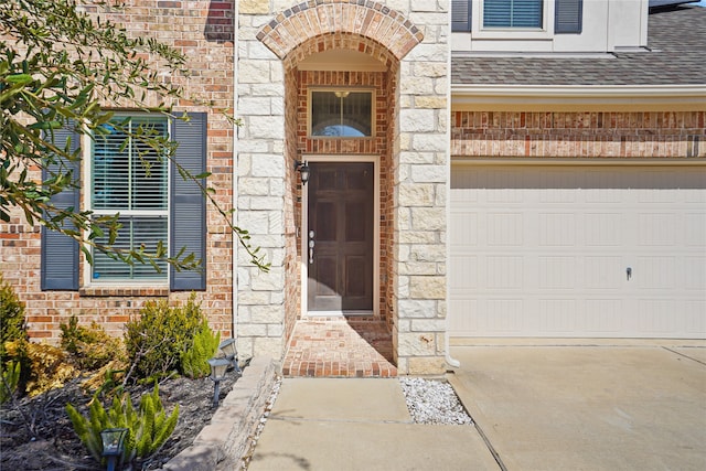 property entrance with a garage