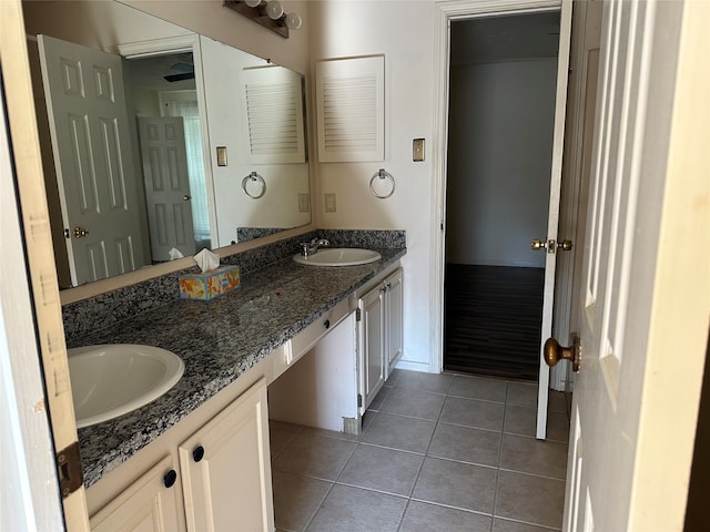 bathroom with vanity and tile patterned floors