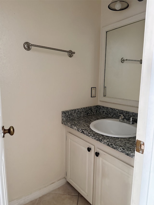 bathroom featuring vanity and tile patterned flooring