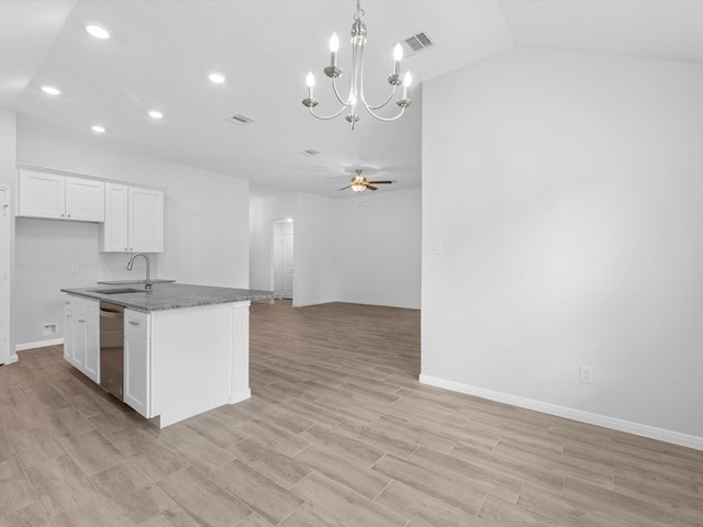 kitchen with dishwasher, sink, pendant lighting, white cabinets, and a center island with sink