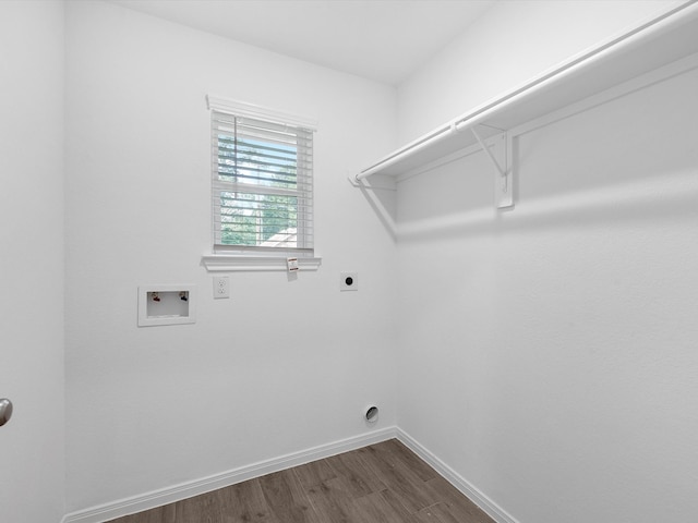 washroom with hookup for a washing machine, wood-type flooring, and hookup for an electric dryer