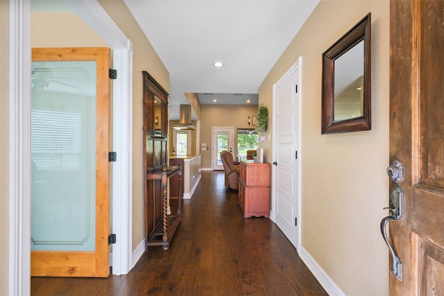 hall featuring dark wood-type flooring