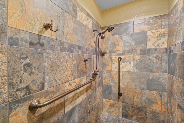 details featuring a tile shower