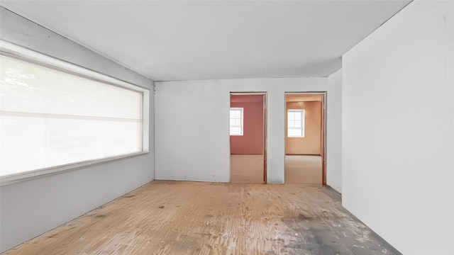 spare room featuring light hardwood / wood-style flooring