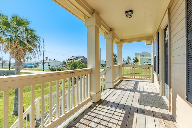 16534 Francis Drake Rd, Jamaica Beach, TX 77554 - wooden deck with a yard and a residential view