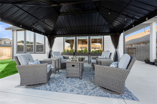 view of patio featuring a gazebo and an outdoor hangout area