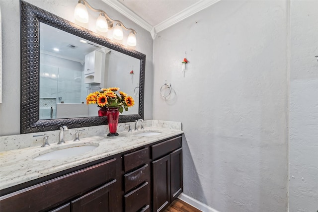 bathroom featuring hardwood / wood-style floors, vanity, an enclosed shower, and crown molding