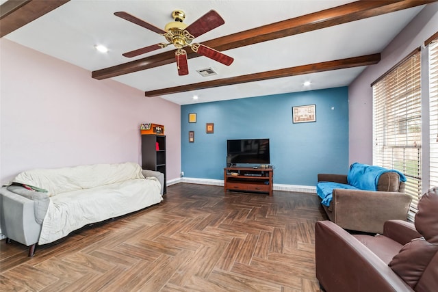 living room featuring beam ceiling, dark parquet floors, and ceiling fan