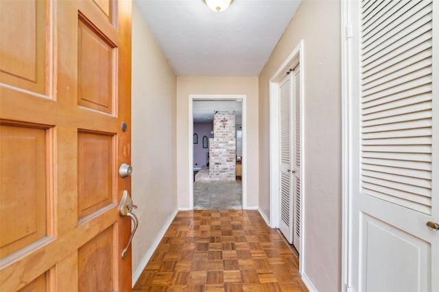 corridor with dark parquet floors