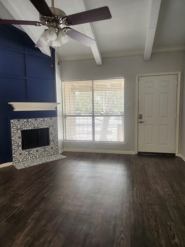 unfurnished living room with beam ceiling, a fireplace, and dark hardwood / wood-style floors