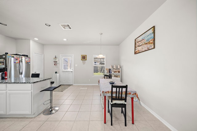 view of tiled dining room