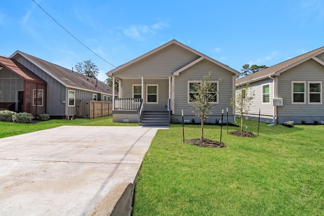 bungalow-style house featuring a front yard