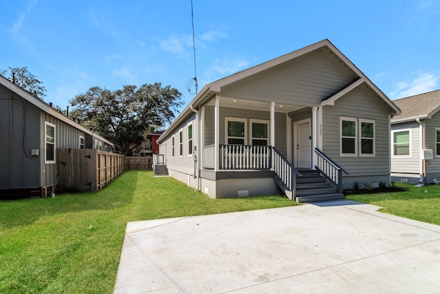 bungalow with a front yard