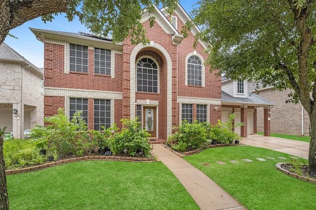 view of front of property featuring a front lawn