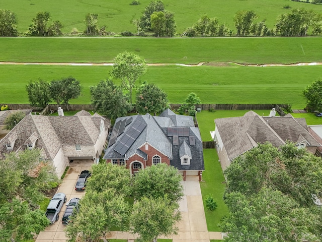 birds eye view of property featuring a rural view