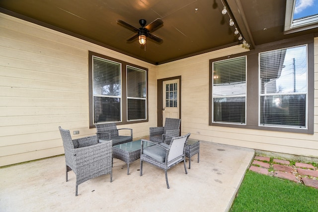 view of patio / terrace featuring ceiling fan