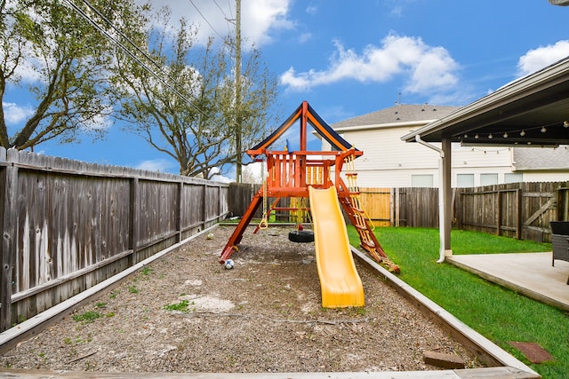 view of play area featuring a lawn