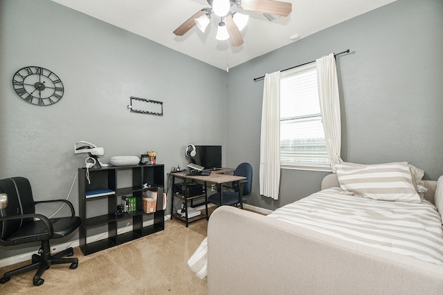 bedroom with light carpet and ceiling fan