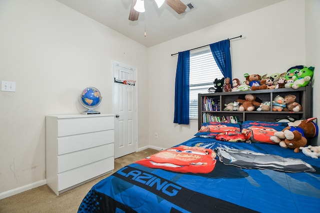 carpeted bedroom featuring ceiling fan