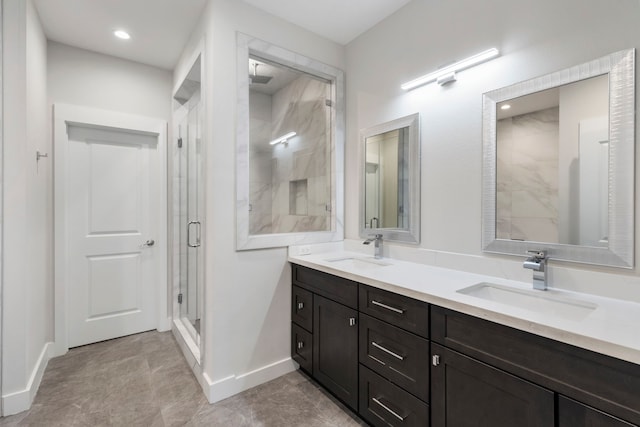 bathroom with vanity and walk in shower