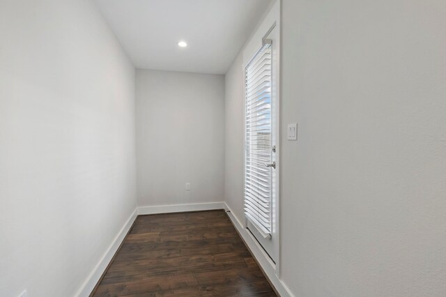 hall featuring dark wood-type flooring