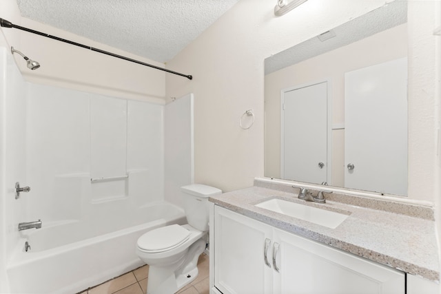 full bathroom with tile patterned floors, toilet, shower / bathtub combination, vanity, and a textured ceiling