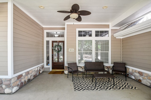 property entrance with ceiling fan